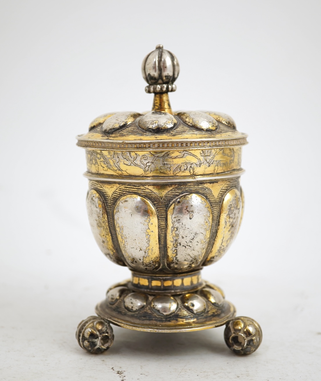 A 16th/17th century German silver gilt 'pineapple' cup and cover